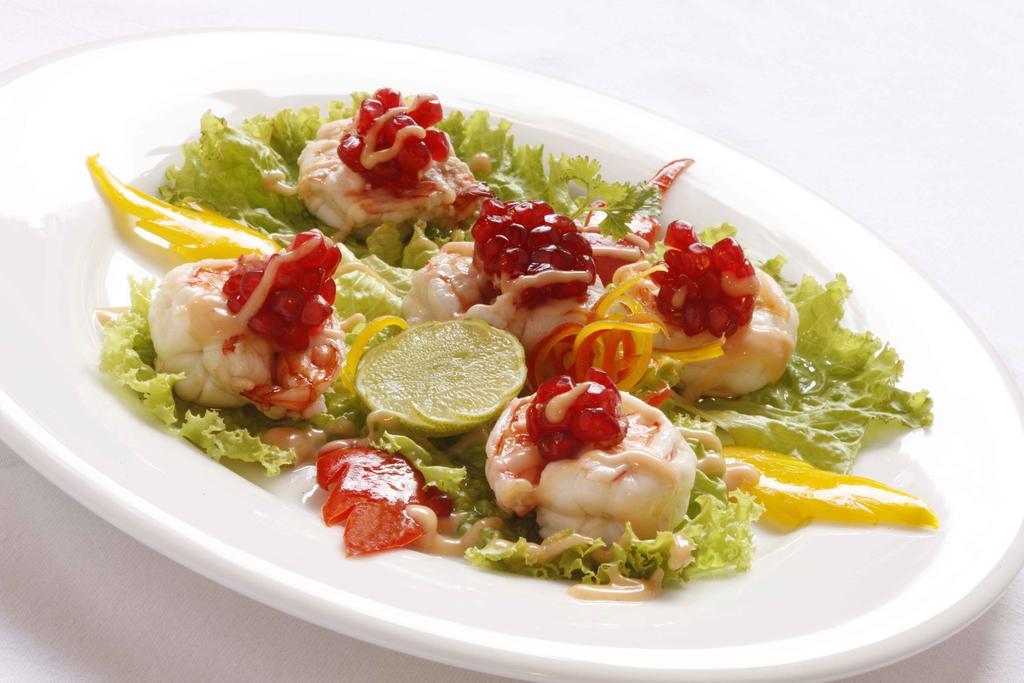 โรงแรมเดอะ เฮอริเทจ มาดูไร มทุราย ภายนอก รูปภาพ A salad of scallops